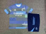 Real Madrid 2025-26 Light Blue (Camo Edition) Short Sleeve Kids Training Kit - Image 2