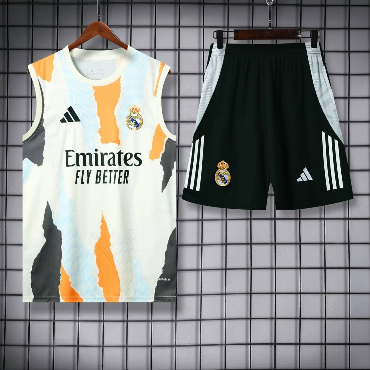 Real Madrid 2025-26 Orange Torn Vest Training Kit - Image 3